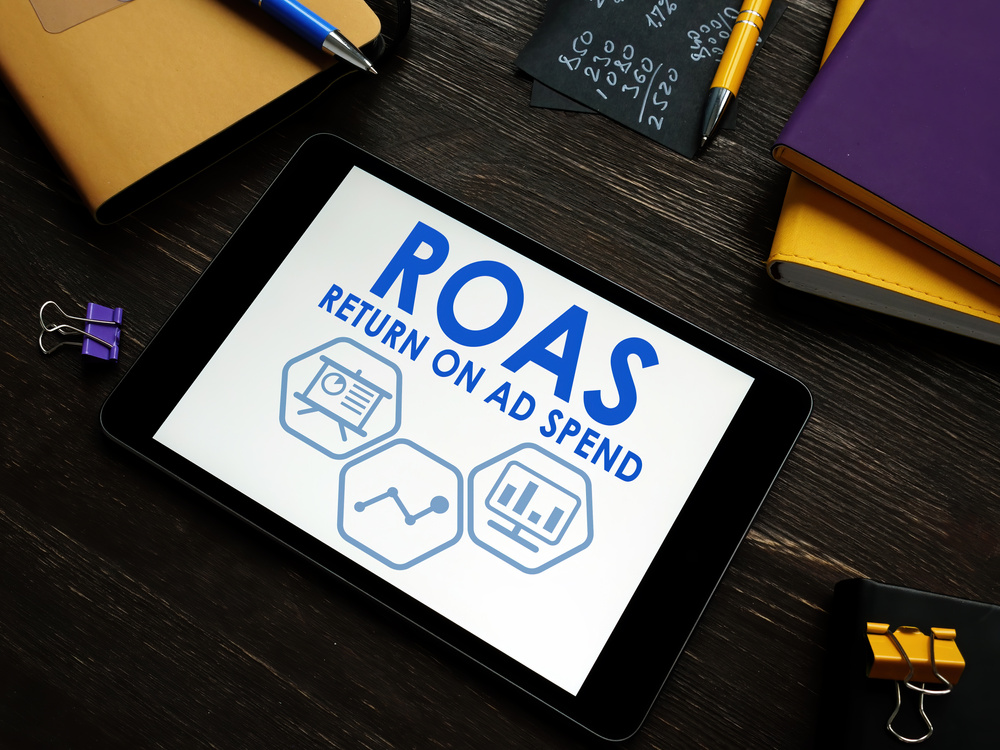 ROAS Return on Ad Spend report on a tablet.